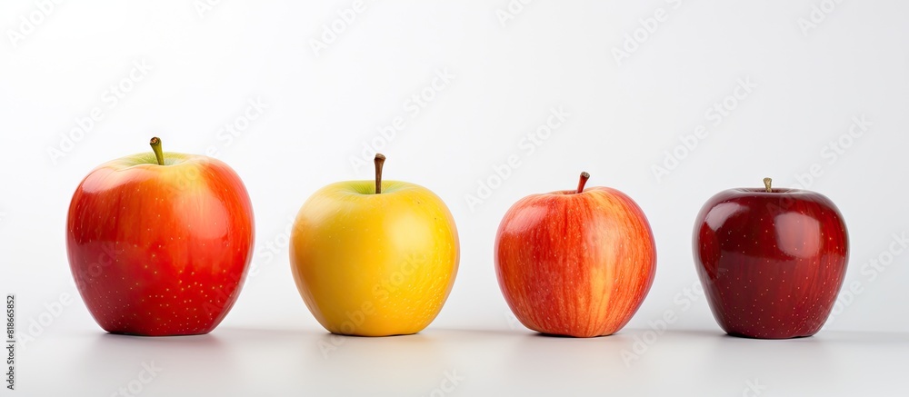 Poster copy space image of red apple orange and mosambi fruit displayed against a white backdrop
