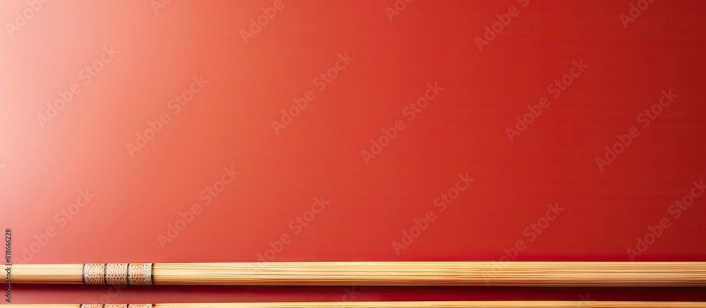 Aufkleber A close up image of wooden chopsticks and a chopstick rest on a vibrant paper background Plenty of empty space for text or design. with copy space image. Place for adding text or design