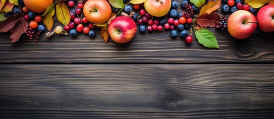 Autumn themed background with berries apples and vibrant leaves on a wooden backdrop creating a copy space image that exemplifies the essence of the season - Powered by Adobe