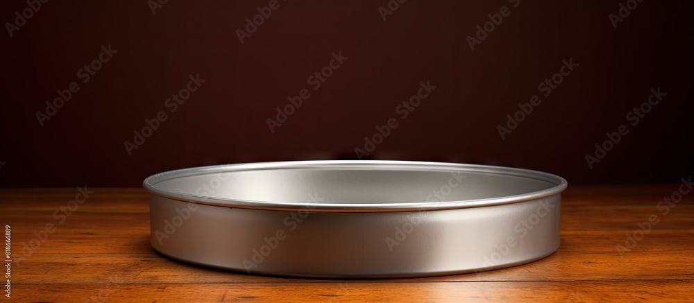 Poster A copy space image of a lonely cake pan specifically designed for baking