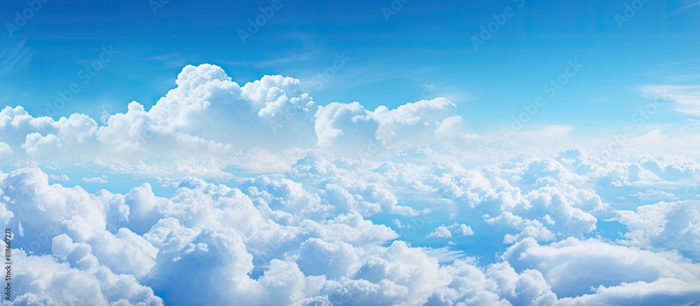 Aufkleber A breathtaking sky filled with fluffy white clouds perfect for capturing a stunning image with ample empty space