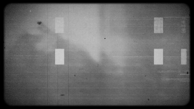 Black and white old film frame with scratches and glitches