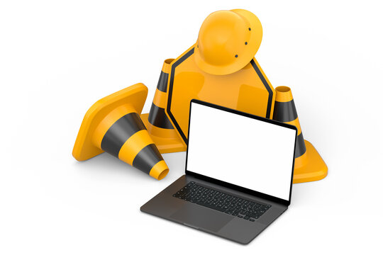 Set of safety helmet or hard hat, road traffic cones and sign near laptop