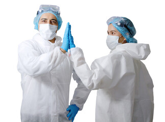 Medical team in personal protective equipment or PPE clothing is touching the hands to encourage together and healing for patient infected with the Covid19 virus in hospital 