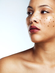 Skincare, woman and face with glitter freckles for elegant makeup aesthetic and dermatology...