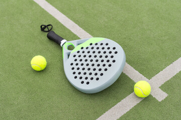 Paddle tennis objects on grass court