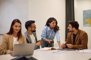 Group of business colleagues talking on  meeting in office.