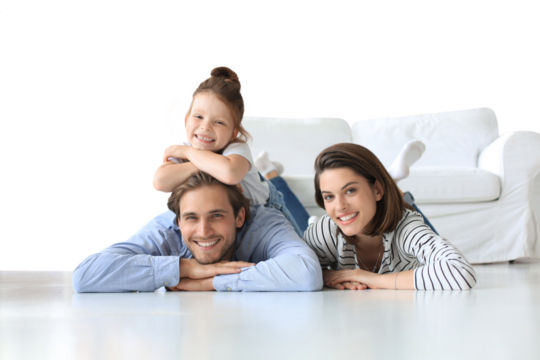 Young Caucasian family with small daughter pose relax on floor in living room, smiling little girl kid hug embrace parents, show love and gratitude on a transparent background
