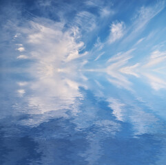 Sky background and water reflection.