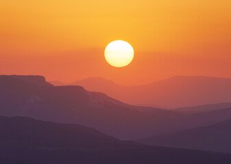 Sun and mountain on sunrise.