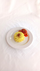 Banjar style Yellow Rice with Masak Habang Spicy Braised Egg Dish