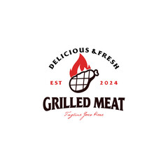 Grilled meat logo in vintage style, grilled meat with fire is a design symbol