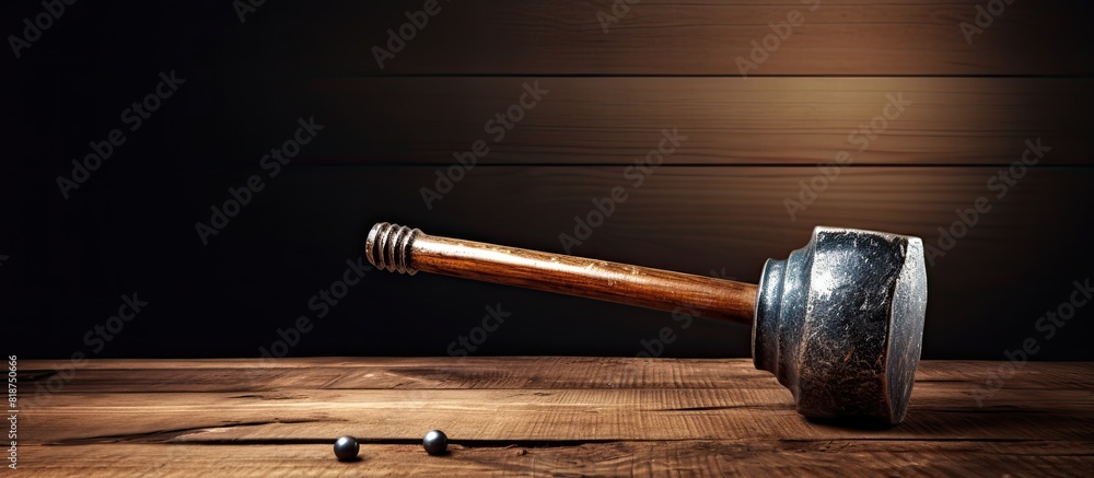 Poster An image of a hammer and nails placed on a wooden background with empty space for text or other elements. Creative banner. Copyspace image