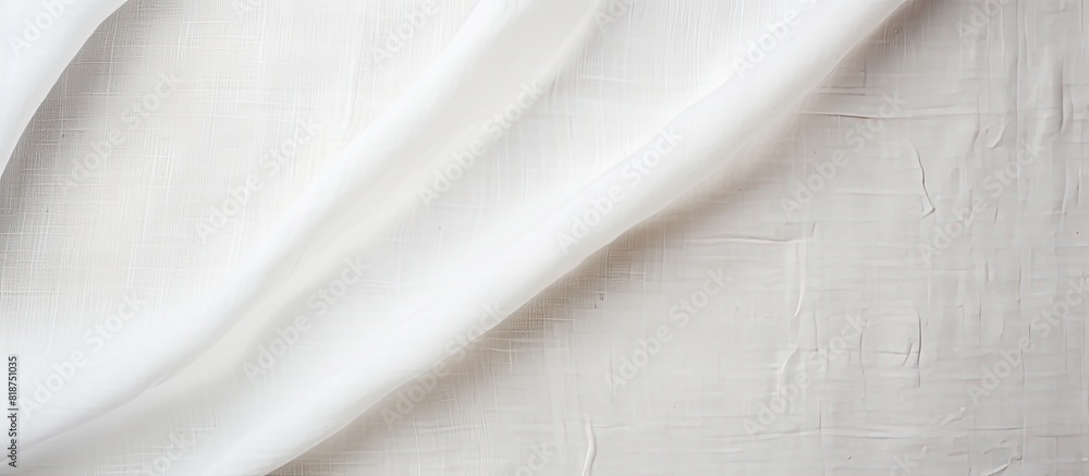 Leinwandbilder A top down view of a white linen canvas creates a textured background image providing a mock up with ample copy space