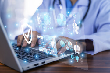 Doctors efficiently assess patient health by reviewing medical data on the computer, ensuring...