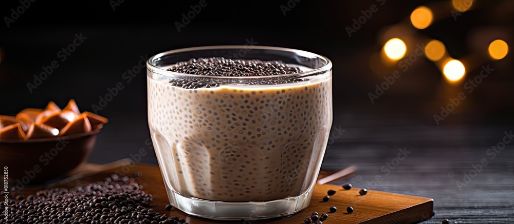 Poster a vegan friendly chia pudding made with black chia seeds and soya milk presented in a simple manner 