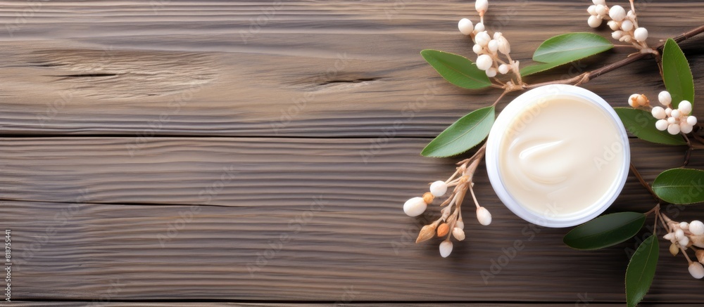 Poster top view of lip balms and branches on a wooden background with space for text. creative banner. copy