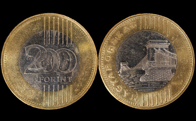Close-up of a Hungarian 200 forint coin, the money of Hungary on a black background