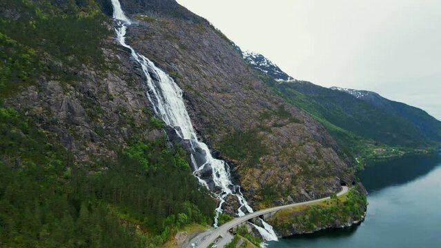 4K drone shot of Langfoss Waterfall in Odda, Norway.