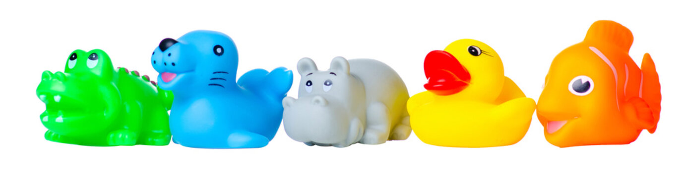 Colorful rubber baby bath toys on white background isolation