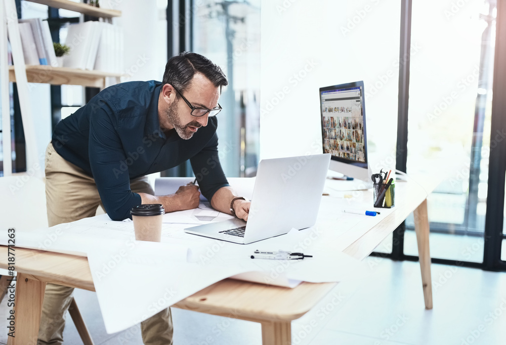 Poster frustrated, mature man and architect with laptop and blueprints for building planning and design pro