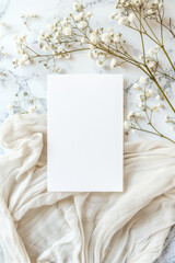 A white card with a flower on it