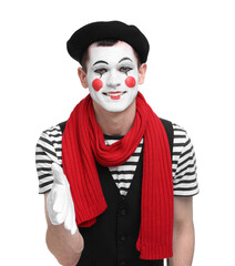 Funny mime artist greeting someone on white background