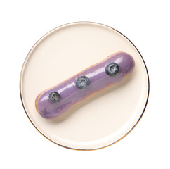 Delicious eclair decorated with blueberries isolated on white, top view