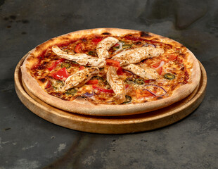 Delicious pizza with ham, mozzarella, jalapenos, onions and grilled chicken