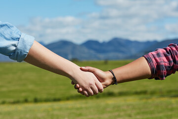 Field, arms and holding hands in nature for support, direction and guidance on grass. People,...