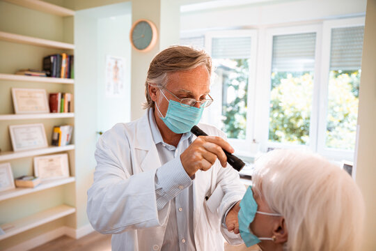 Senior woman having an eye exam in the doctors office