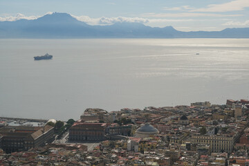Picturesque panoramic scenic narrow alleys with traditional cobblestone streets and Souvenir shops in Old Town of Naples Napoli, Italy famous tourist attraction outlook Vesuv volcano Summer cruise