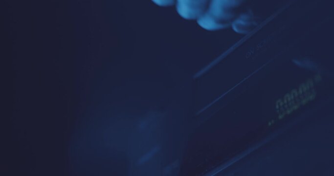 Playing a VHS tape in a VCR video recorder