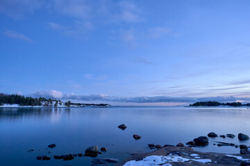 Stunning sunrise illuminating the icy sea on a cold morning