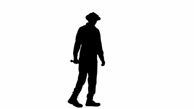 Black silhouette of maniac man in jumpsuit poses with wooden baseball bat. Unrecognizable man with curly hair on white isolated background.
