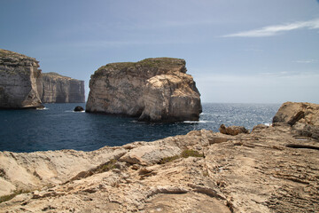 Beautiful shot of stunning rocky landscape surrounding Dwejra Bay, Malta