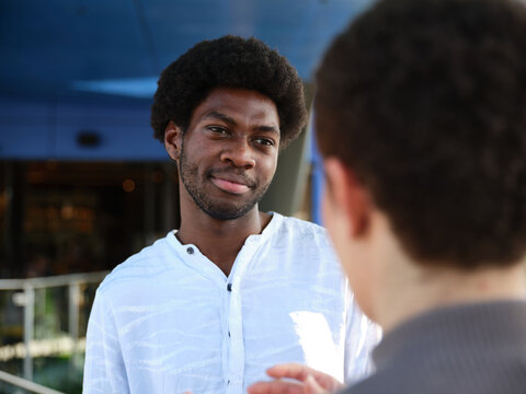 Man having a conversation outside