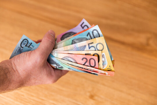 a fist full of Australian money