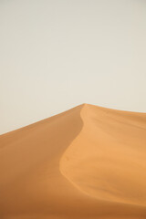Mingsha Mountain and Crescent Lake in Dunhuang, Gansu Province - Desert scenery under clear sky