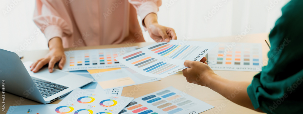 Poster creative graphic design presents selective color while manager using laptop comparing suitable color