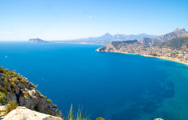 Fototapeta premium Peñón de Ifach Natural Park (Penyal d'Ifac) , Small nature reserve with a large limestone outcrop, trails and panoramic views of Calpe, Mediterranean coast of Alicante and the Gulf of Valencia, Spain.