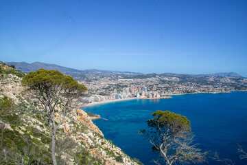 Obraz premium Peñón de Ifach Natural Park (Penyal d'Ifac) , Small nature reserve with a large limestone outcrop, trails and panoramic views of Calpe, Mediterranean coast of Alicante and the Gulf of Valencia, Spain.