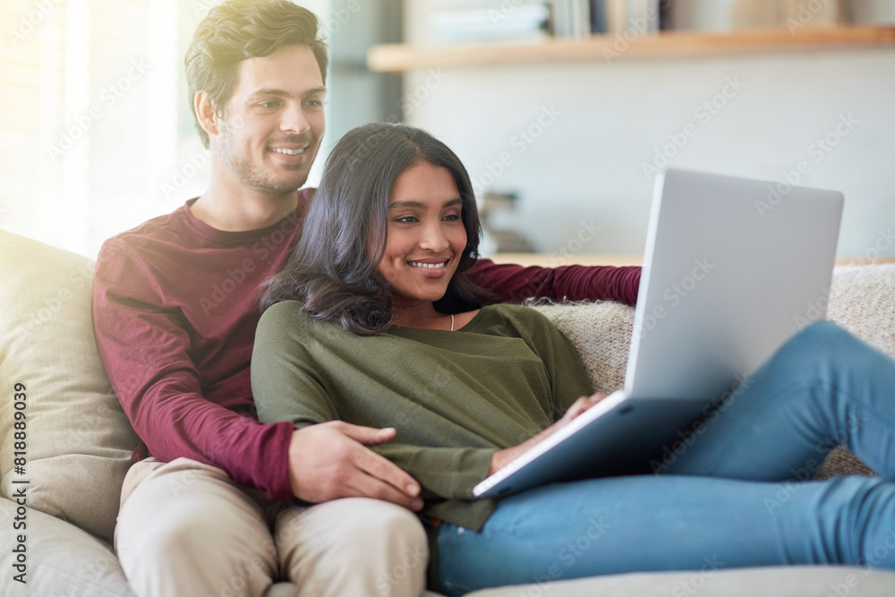 Sticker Couple, watch and laptop for movies, bonding and entertainment with subscription on sofa and lounge. People, man and woman with computer, enjoy and internet for video, home and cozy for date on couch