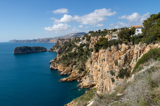 Cap de la Nau, beautiful views of the cliffs and the blue sea of Alicante, on the Gulf of Valencia, Mediterranean Sea, Spain 