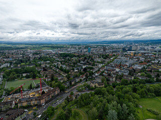Fototapeta premium Aerial view of Swiss City of Zürich with cityscape and skyline on a cloudy spring day. Photo taken May 17th, 2024, Zurich, Switzerland.