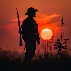 Civil war soldier silhouette. Sunset in the battlefield. Back light warm haze