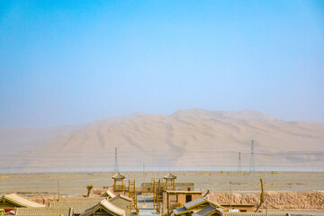 Dunhuang Silk Road Heritage City, Dunhuang City, Gansu Province - Desert buildings and sand dunes