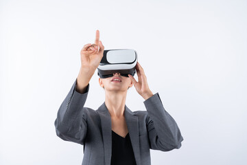 Professional female leader touching at program or working while using VR glasses. Skilled...