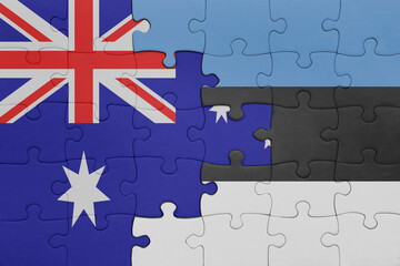 puzzle with the colourful national flag of estonia and flag of australia.