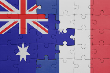 puzzle with the colourful national flag of france and flag of australia.